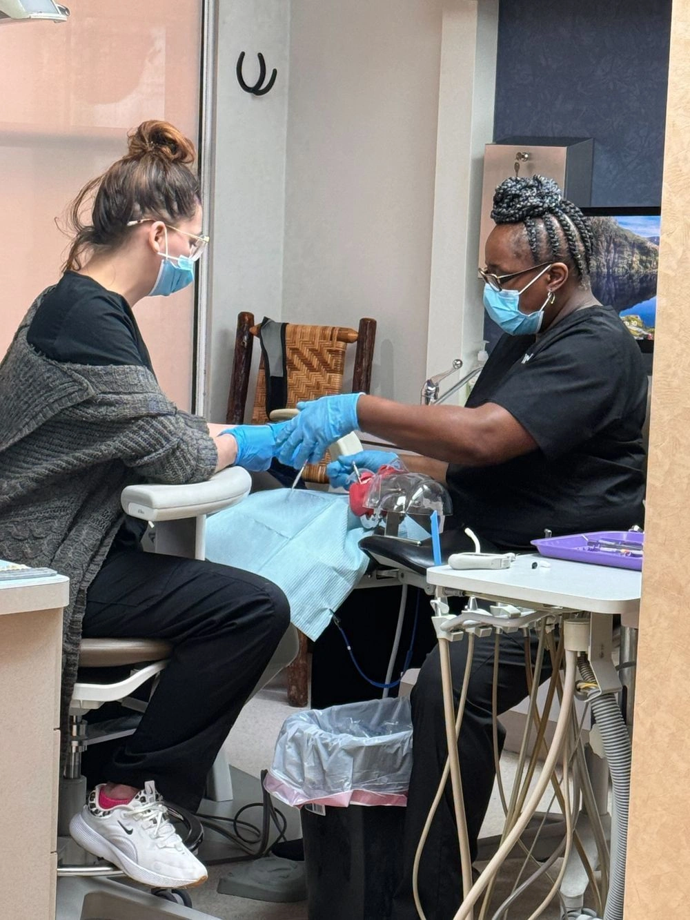 Dental assistant training with real office equipment